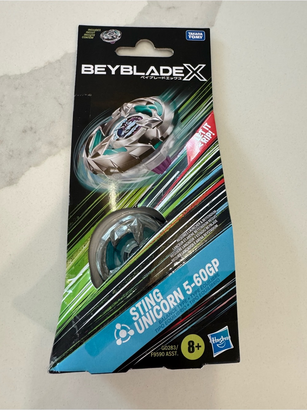 Hasbro Beyblade X Sting Unicorn 5-60GP Spinner - Teal and Silver